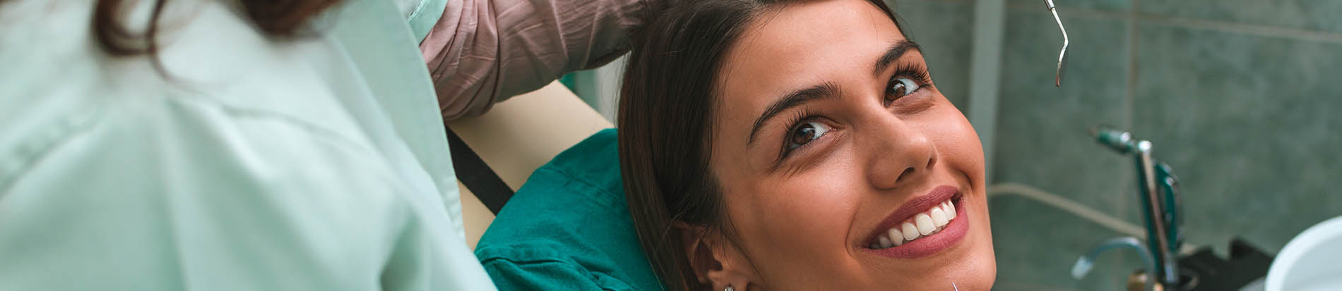 Smiles Dental at Reston Town Center | Implant Restorations, Invisalign reg and Fluoride Treatment